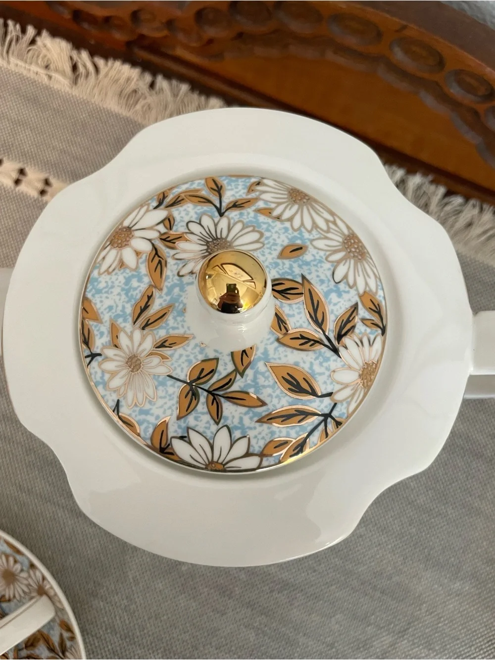 Elegant Floral Porcelain Teapot and Cup Set in Blue and Gold
